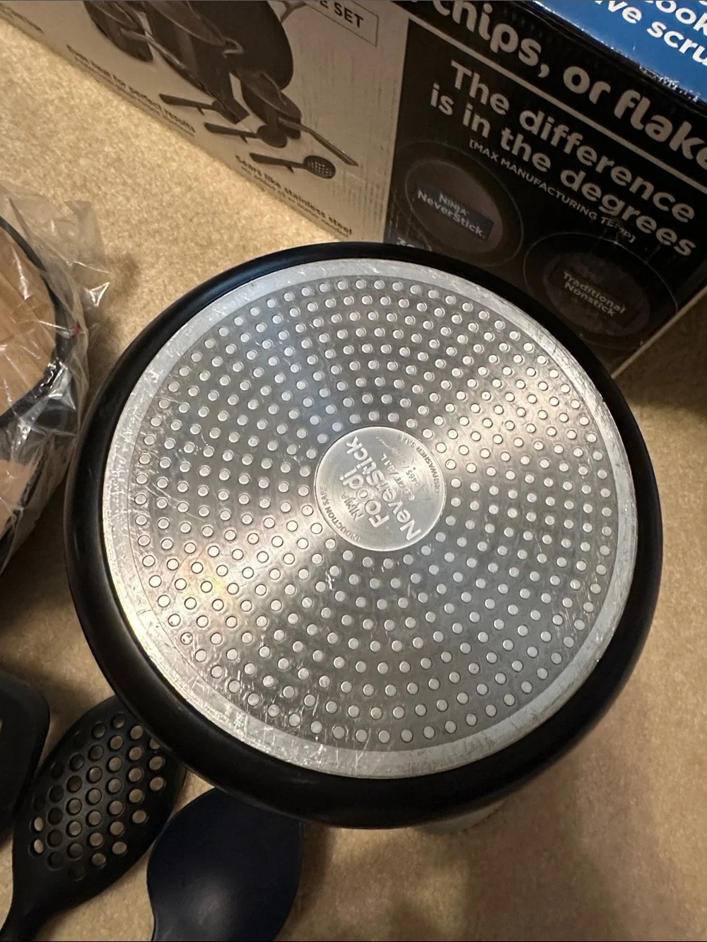 Ninja cookware set in black and stainless steel with glass lid